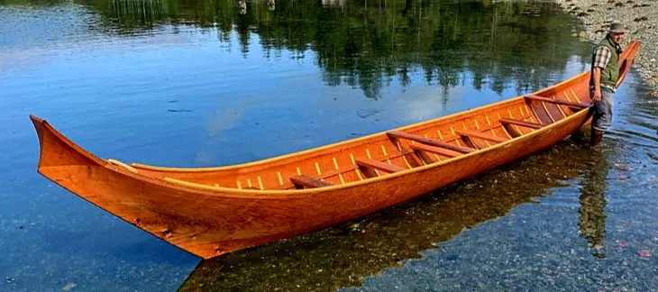 Custom-built 6-meter wooden sailboats and canoes